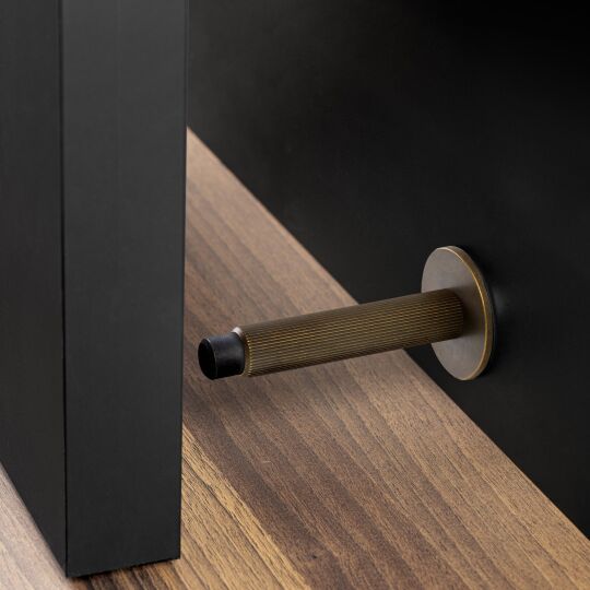 Deurstopper Arpa wall Ø-19mm L-100mm Donker antiek brons